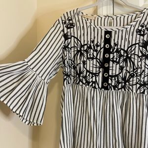 Black white and silver shirt , flare